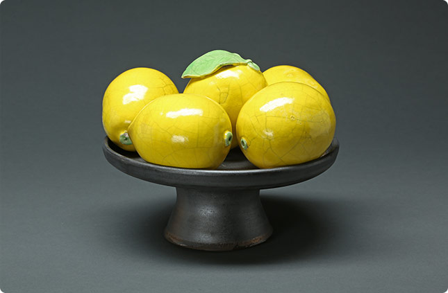 5 Lemons on Pedestal